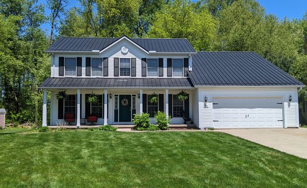 residential home with metal roof